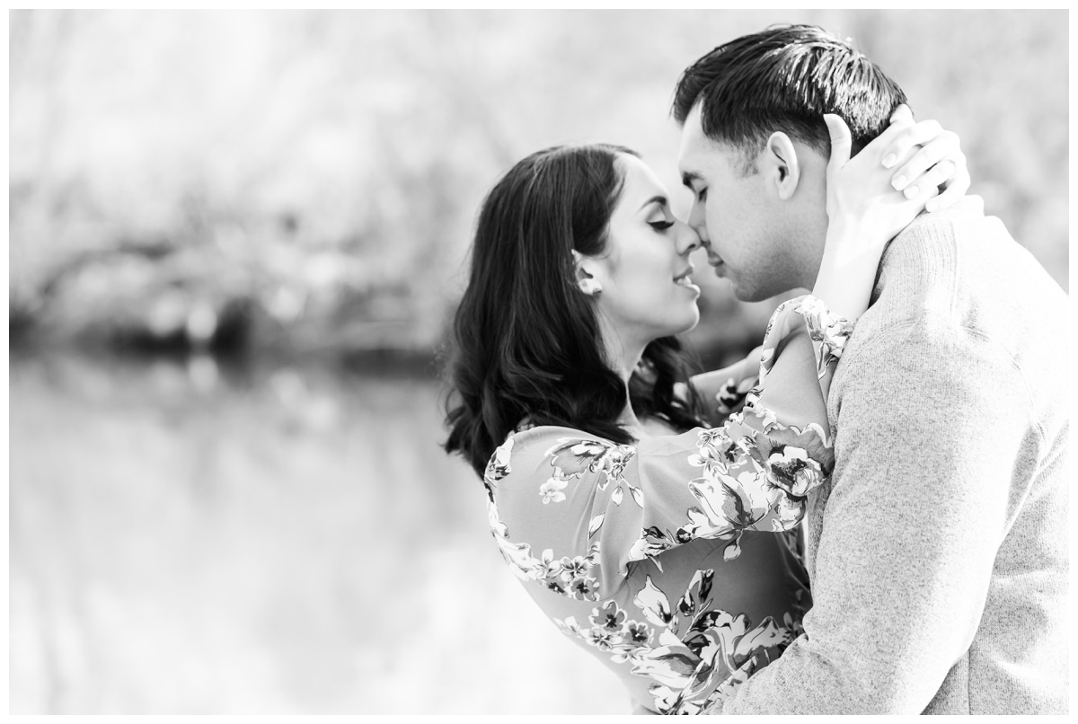 black and white image of couple kissing