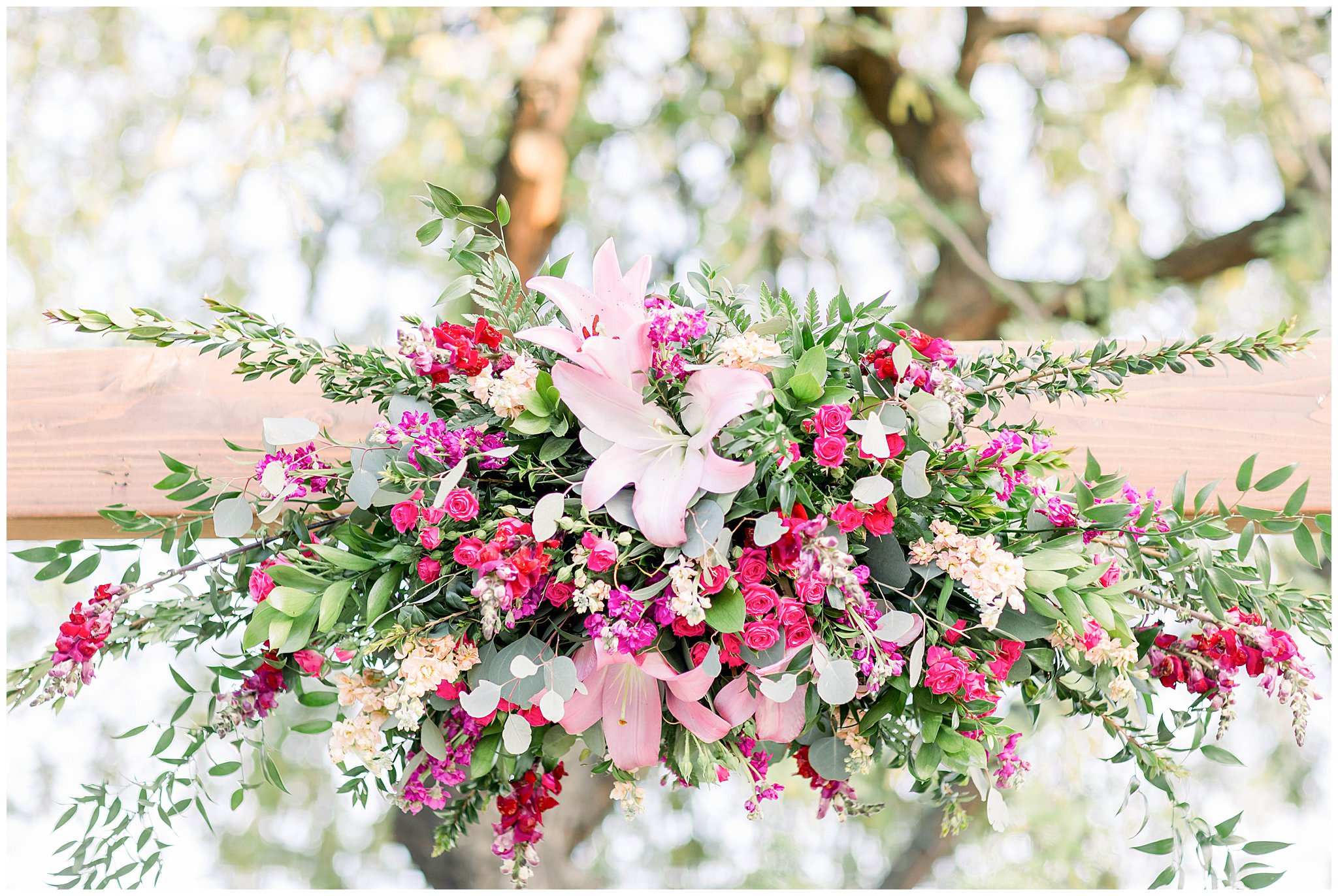 wedding arch, fuchsia florals