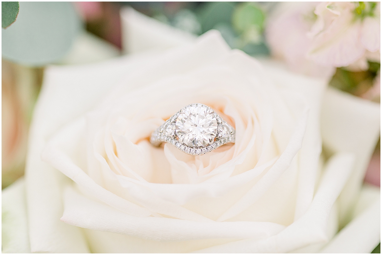 Wedding ring in white rose