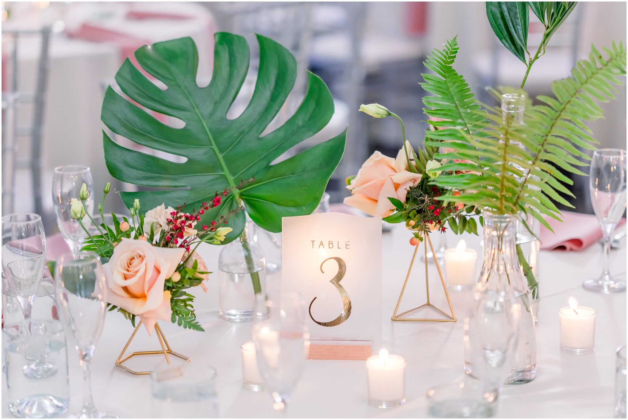 votive candles, tropical leaves, table decor, SoHo63 reception