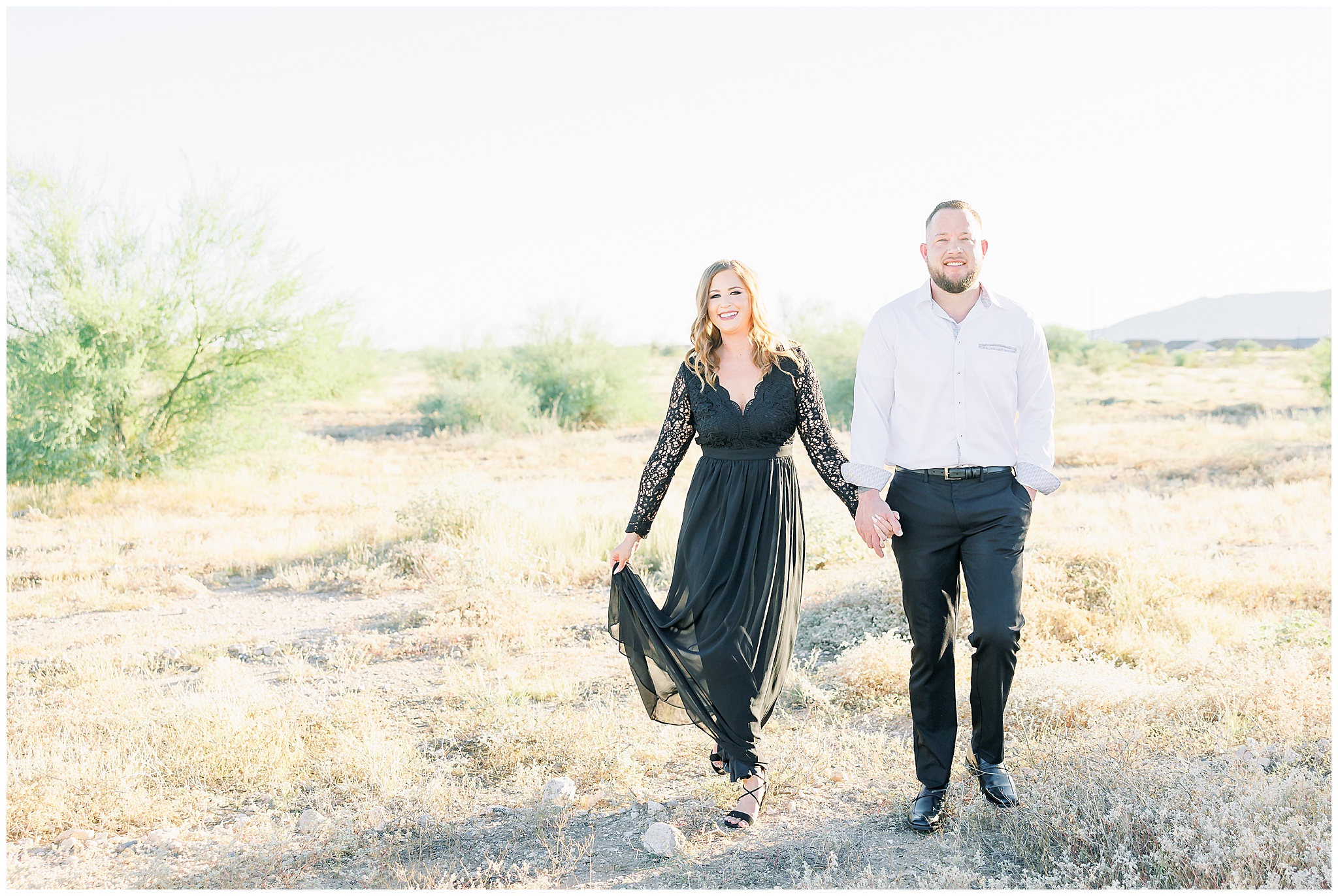 desert engagement session, couple posing in desert, black maxi dress