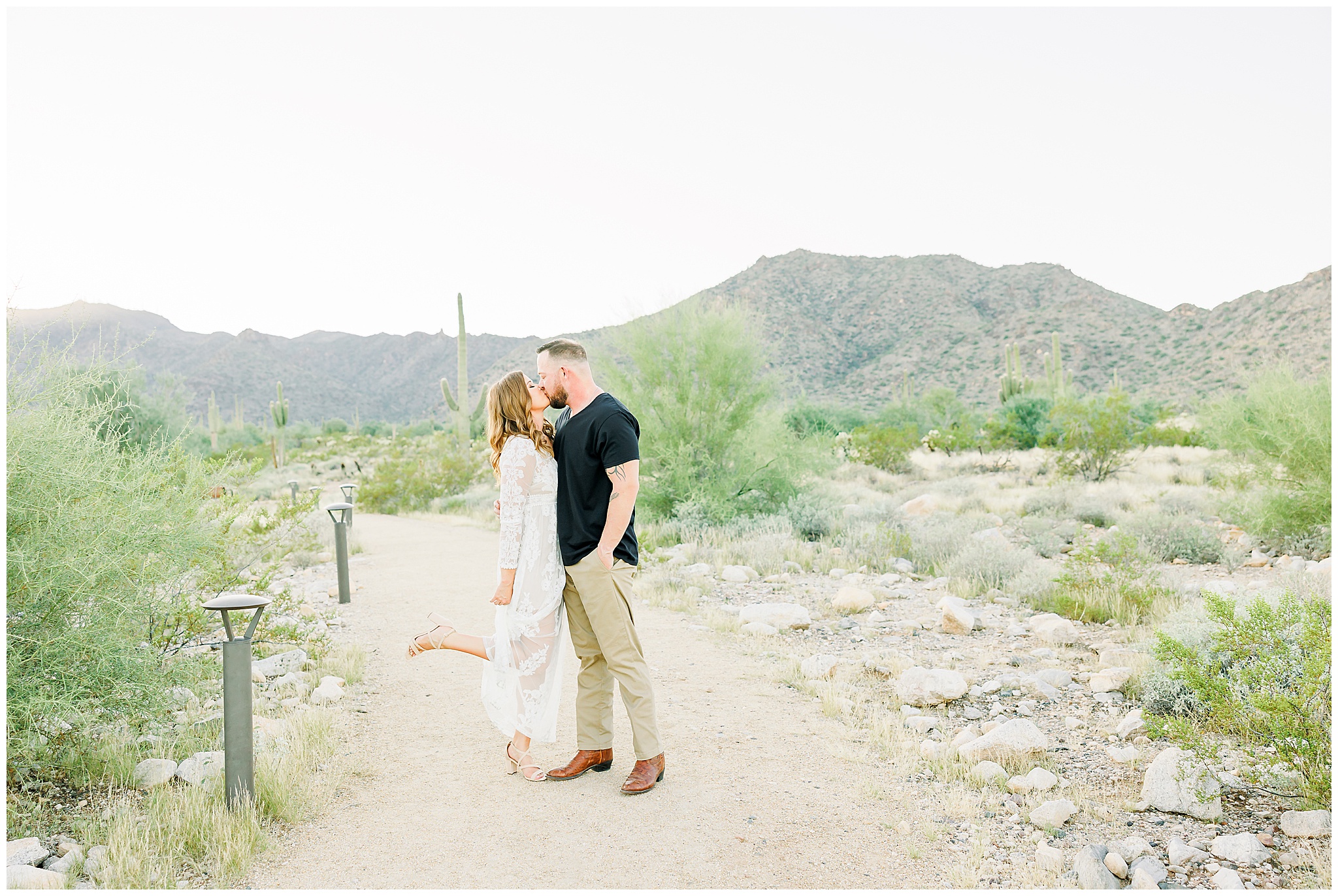 desert engagement session, couple posing in desert, white maxi dress