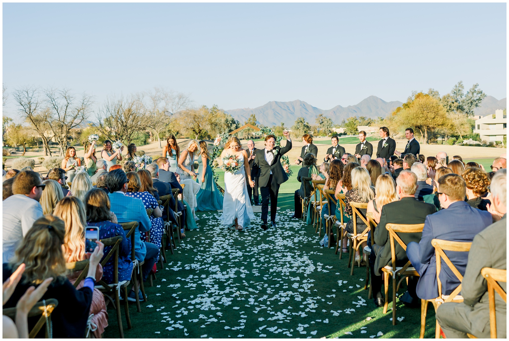 Couple walking down the aisle at Gainey ranch