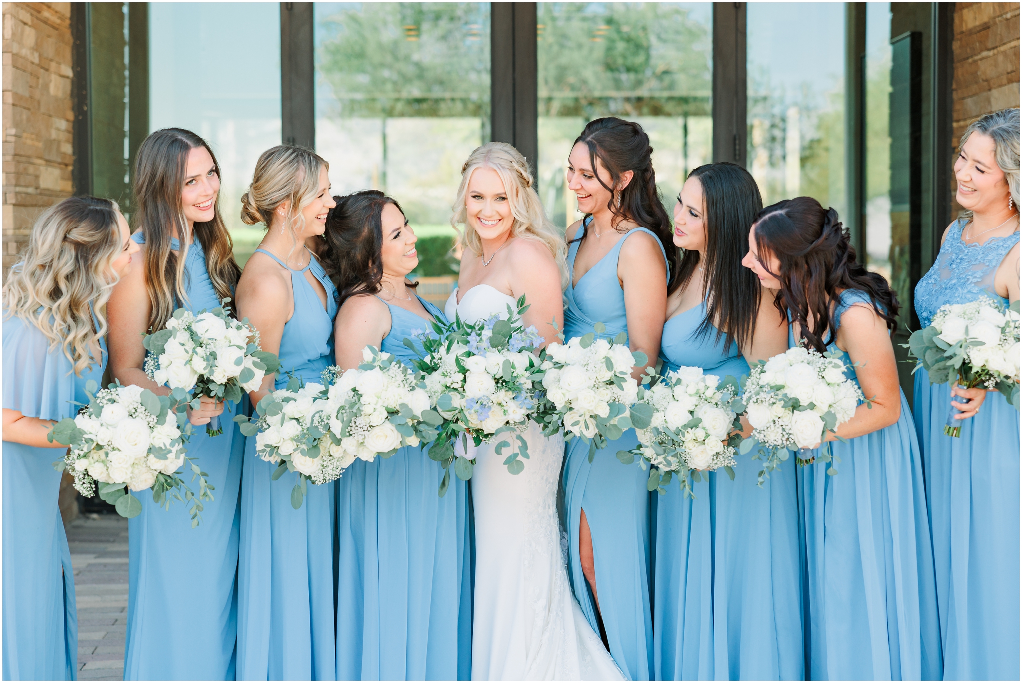Bridesmaids in blue dresses
